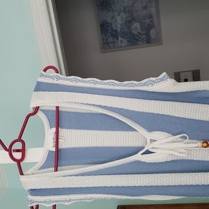 A white and blue cover up- dress.